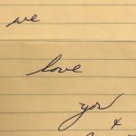 Snippet from old handwritten letter showing the words: we love you.