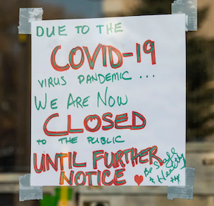 Sign on a business that says "Due to COVID-19 we are CLOSED until further notice," illustrating a post about how the prayer Unetaneh Tokef offers wisdom for challenging times