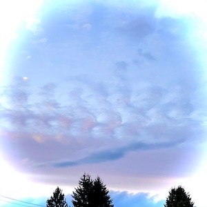 photo of a weird cloud formation illustrating a post about cosmic forces in alignment